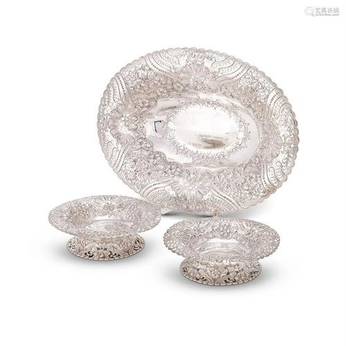 A SUITE OF THREE LATE VICTORIAN SILVER BASKETS BY