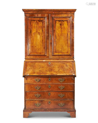 A WALNUT BUREAU BOOKCASE, 18TH CENTURY AND LA…