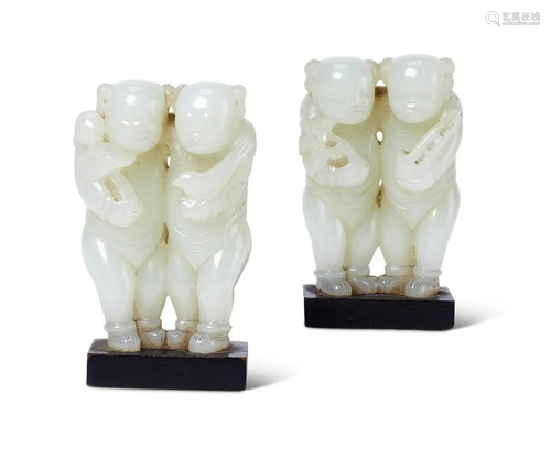 A PAIR OF CHINESE JADE GROUPS OF BOYS, QING DYNASTY,