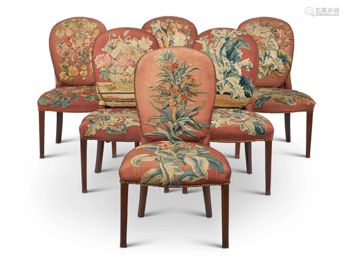 A SET OF SIX GEORGE III MAHOGANY AND UPHOLSTERED SIDE