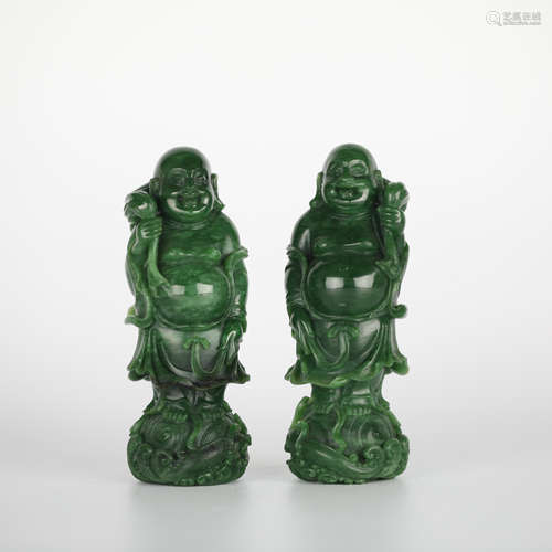 A pair of Chinese green jasper carved figures