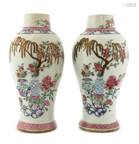 A pair of Chinese export famille rose vases,