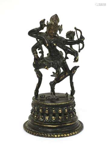 A Tibetan bronze figure of Kurukulla,