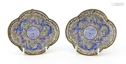 A pair of Chinese export Canton painted enamel saucers,