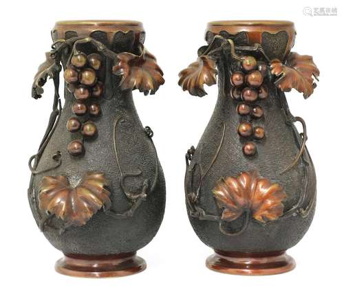 A pair of Japanese bronze vases,