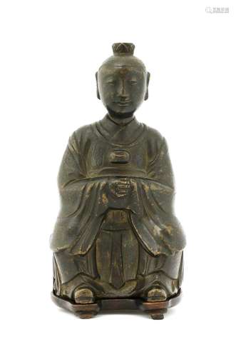 A Chinese brass Daoist figure,