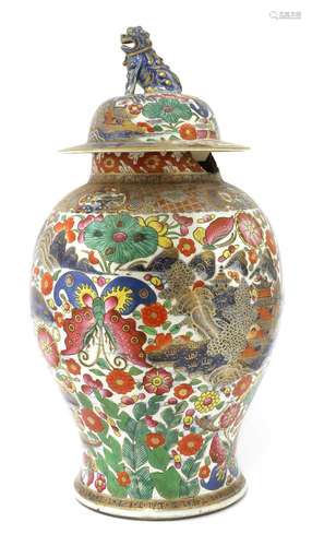 A Chinese export clobbered blue and white jar and cover,