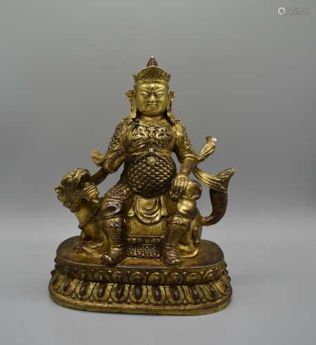 Gilt lacquer Bronze Buddhist Official on Beast