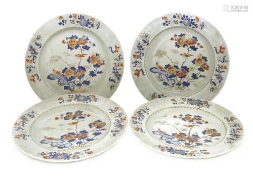 A collection of four Chinese export famille rose chargers,