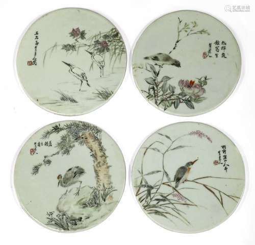 A collection of four Chinese famille rose porcelain panels,