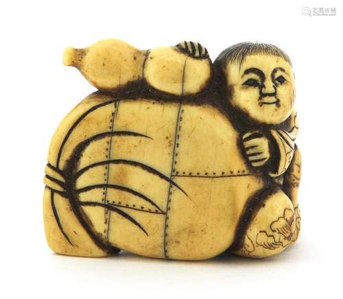 A Japanese ivory netsuke,