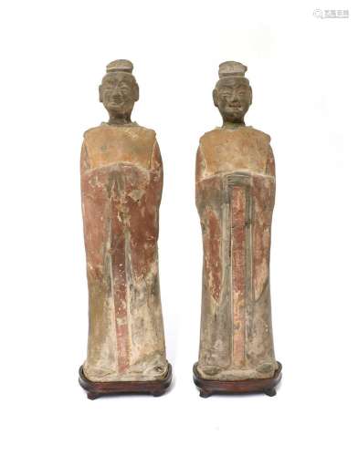 A pair of Chinese pottery figures,