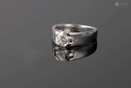 Bague jonc en or gris 18k sertie demi clos d'un diamant rond...