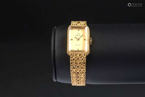 OMEGA.Montre bracelet de dame en or jaune 18k ligne 