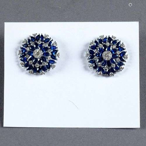 Paire de Boucles d’Oreilles.