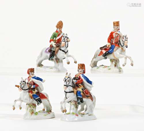 PORCELAIN FIGURINES OF FOUR HUSSARS ON HORSEBACK. Meissen. D...