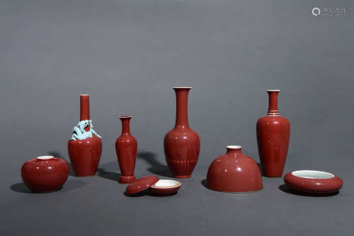 SET OF EIGHT COWPEA-RED GLAZED VASES WATER POTS