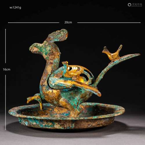 Chinese Han Dynasty
Gilt bronze standing phoenix plate