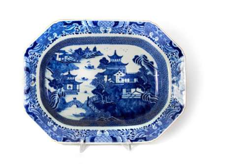 White and blue porcelain octagonal serving plate with landsc...