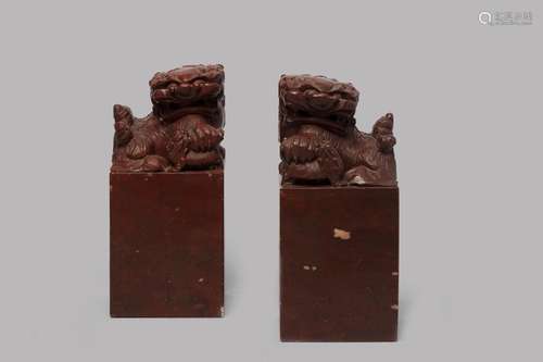 Pair of Pho dogs in soapstone, China, late 19th-early 20th c...