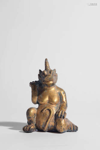 GILT-BRONZE SEATED BEAST