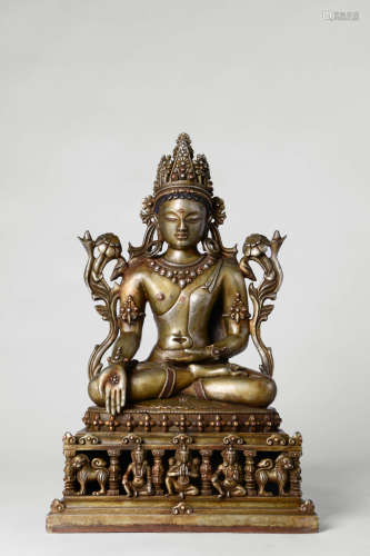 INLAID SILVER FIGURE OF RATNASAMBHAVA BUDDHA