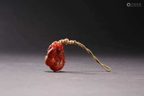 A CHINESE AMBER PENDANT,MING DYNASTY