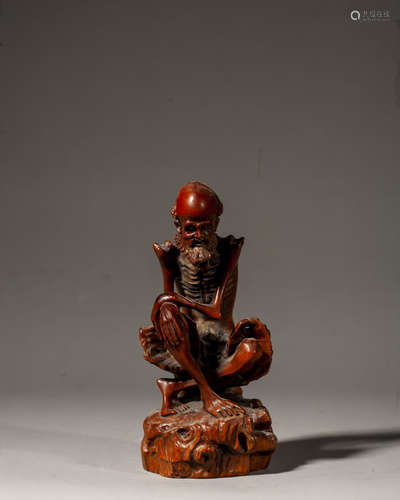 A CHINESE CARVED BOXWOOD FIGURE OF LUOHAN,QING DYNASTY