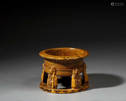 A CHINESE AMBER-GLAZED PORCELAIN ,TANG DYNASTY