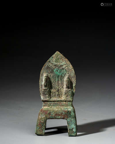 A CHINESE BRONZE VOTIVE GROUP OF BUDDHAS,NORTHERN WEI DYNAST...