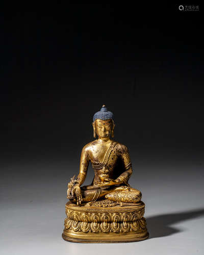 A CHINESE GILT-BRONZE FIGURE OF SAKYAMUNI,QING DYNASTY