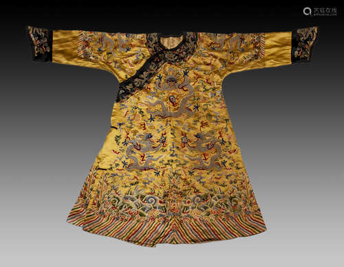 A CHINESE YELLOW KESI TWELVE-SYMBOL DRAGON ROBE,QIANLONG PER...