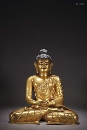 A CHINESE GILT-BRONZE FIGURE OF SAKYAMUNI,QING DYNASTY