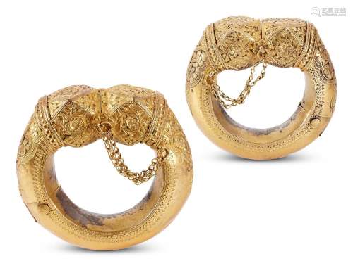 A PAIR OF SILVER GILT INDIAN BANGLES