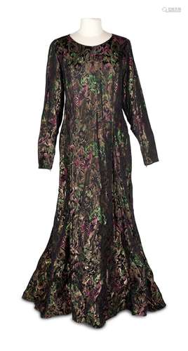 DAME EDITH INTEREST, AN EVENING DRESS IN GILT METAL BROCADE ...