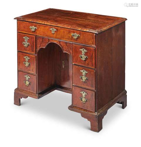 A WALNUT KNEEHOLE DESK, GEORGE II