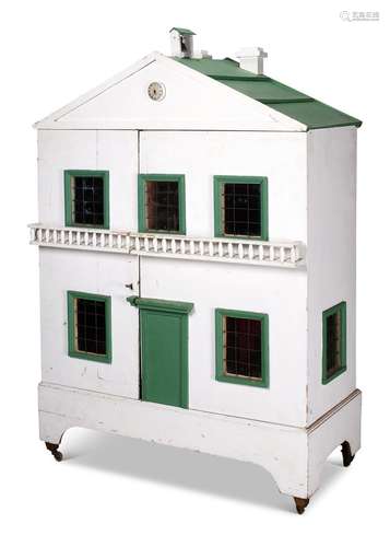 A WHITE AND GREEN PAINTED DOLL'S HOUSE, MID 19TH CENTUR...