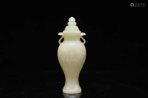 A Fine White Jade 'Sakyamuni' Vase