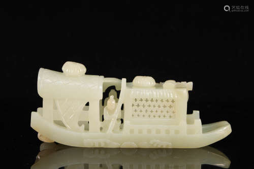 A Rare White Jade Boat Statue