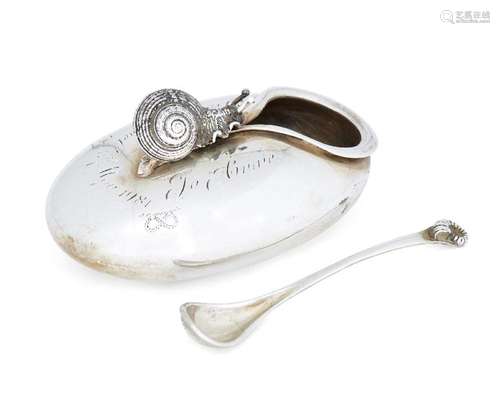 A silver snail salt cellar and spoon by Jocelyn Burton, Lond...