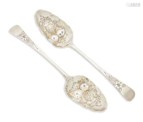 A pair of 18th century Georgian silver berry spoons, London,...