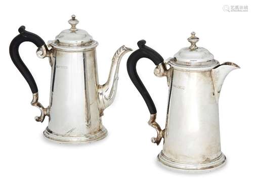 A pair of Edwardian silver cafÃ©-au-lait pots, London, c.190...