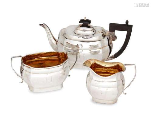 A three piece silver tea set, Birmingham, c.1927, Joseph Glo...