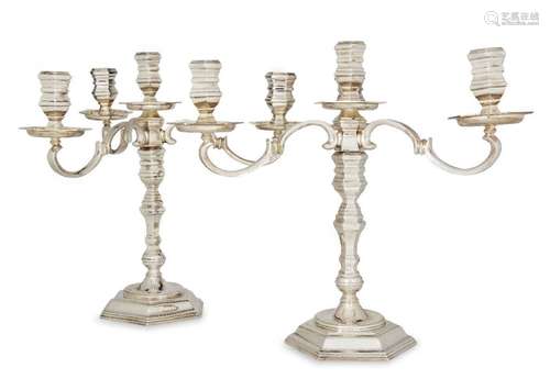 A pair of Elizabeth II silver four light candelabra, London,...