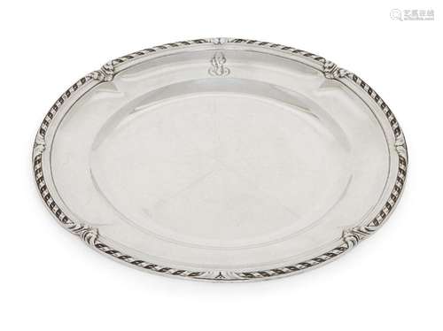 A French silver plate, of shaped circular form with stylised...