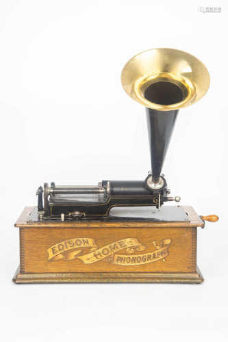 19TH CENTURY AN ANTIQUE PHONOGRAPH WITH 30 ROLLS