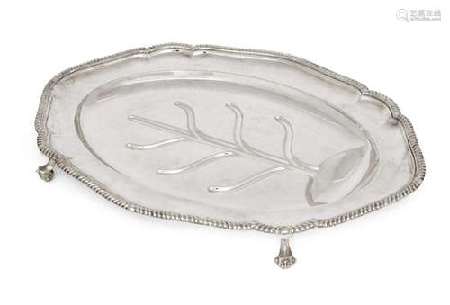 A large silver plated meat platter, with draining grooves an...