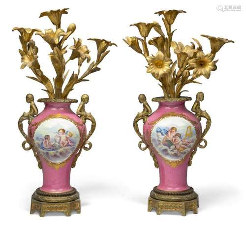 A pair of French gilt-bronze mounted Paris porcelain three-l...