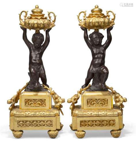 A pair of French gilt and patinated bronze models of putto, ...