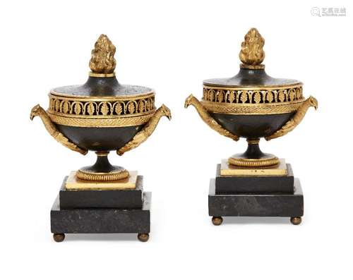 A pair of Empire ormolu and patinated bronze brule-perfums, ...